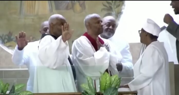 Denzel Washington gets baptized, license to become a minister